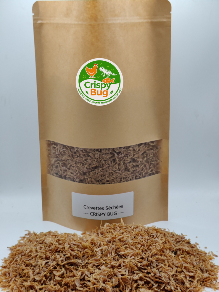 Crevettes  déshydratées et séchées 250 gr avec logo crispybug sur le doypack.  ideal pour decouverte et pour développement tortues, Nac, Poules, reptiles, poissons.  Riches en proteines et oligo elements